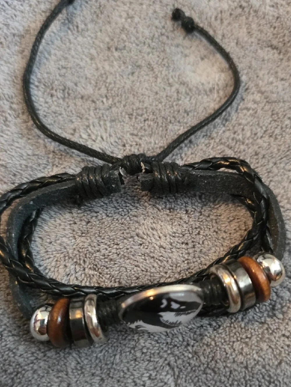 Black Leather Braided Men’s Bracelet with Dino Emblem